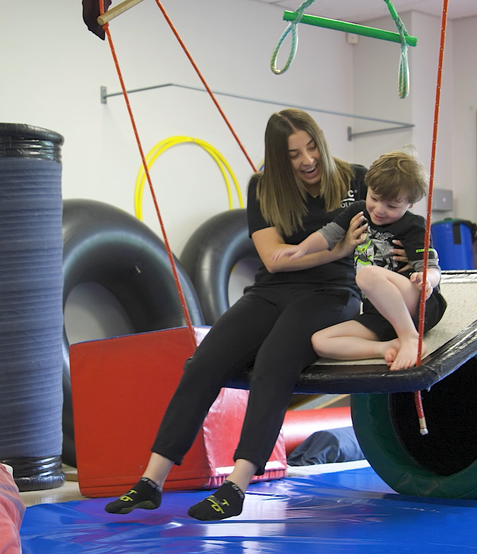 Child Playing with OTFC Team Member